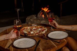 Cena con los pies en la arena en un hotel en Holbox Frente al mar